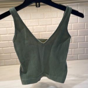 Small greenish/gray ribbed tank.